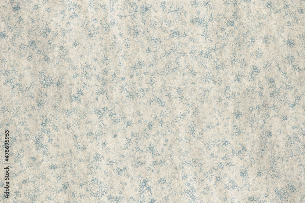 Fototapeta premium snowflakes on paper texture