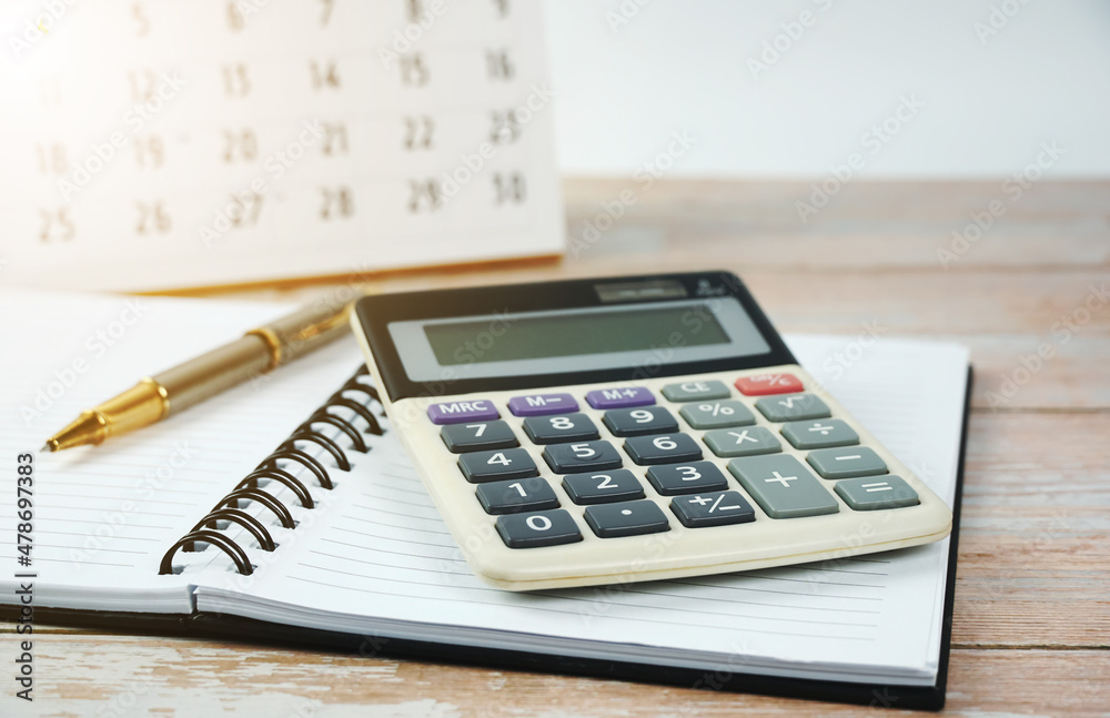 Financial planning, fax, calculator, pen, notebook on the desk. Financial planning, fax, calculator, pen, notebook on the desk.