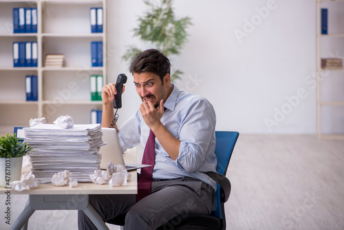 Young male employee in rejected ideas concept