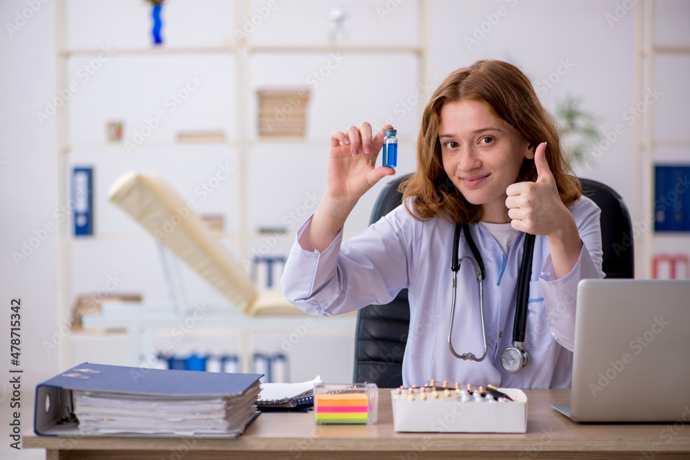Young female doctor workiing in the clinic