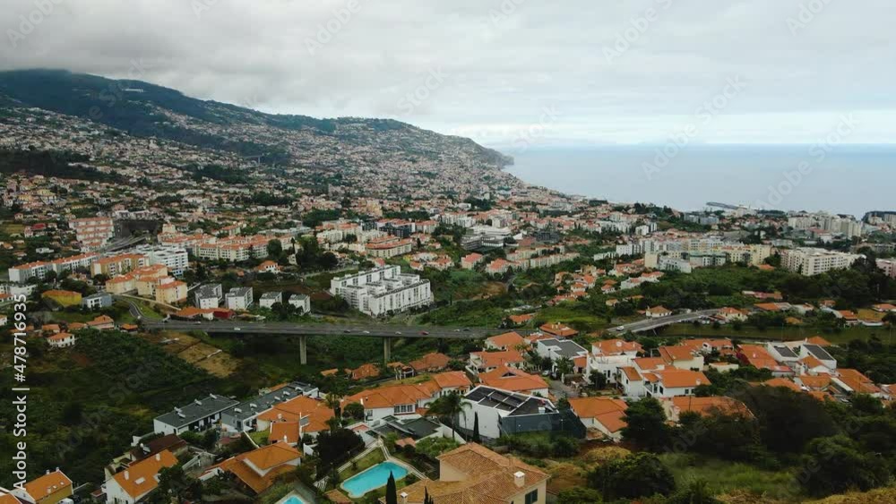 Fly Over Funchal City And Pico Dos Barcelos Lookout In Madeira - aerial shot Fly Over Funchal City And Pico Dos Barcelos Lookout In Madeira - aerial shot