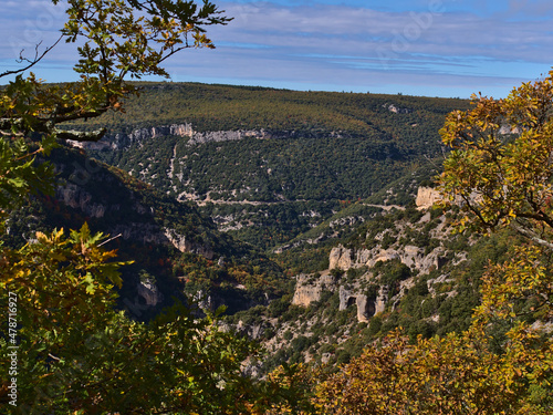 View of popular canyon Gorges de la Nesque in the Vaucluse Mountains in Provence region, France on sunny day in autumn season with rugged limestone.