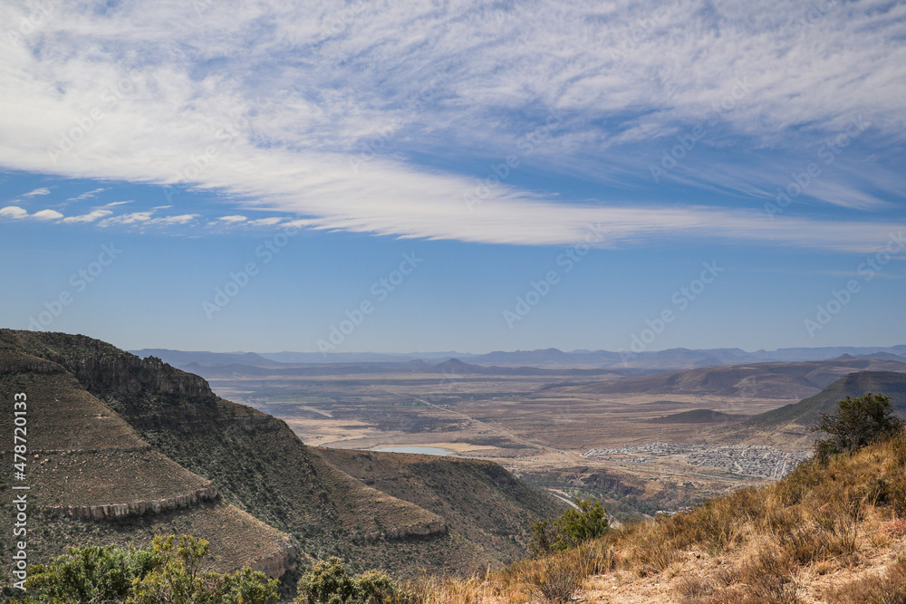 sky and mountain scenery viewed from above graaf reinet and the road to the valley of desolation viewpoint