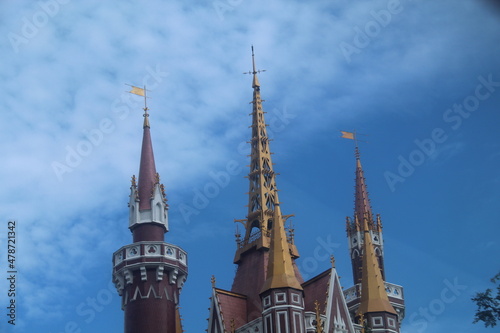 The top of kingdom castle with a cloudy sunny bright sky