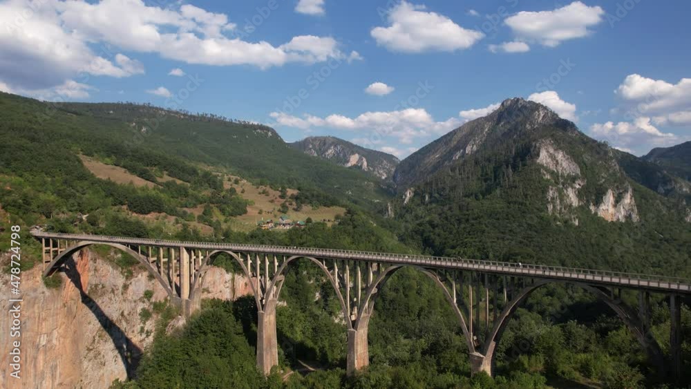 Aerial view of the canyon of the Tara river, mountains and Djurdzhevich bridge, Montenegro, Europe. Travel and nature concept Aerial view of the canyon of the Tara river, mountains and Djurdzhevich bridge, Montenegro, Europe. Travel and nature concept