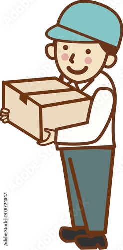 段ボールを持つ帽子をかぶった男性作業員。