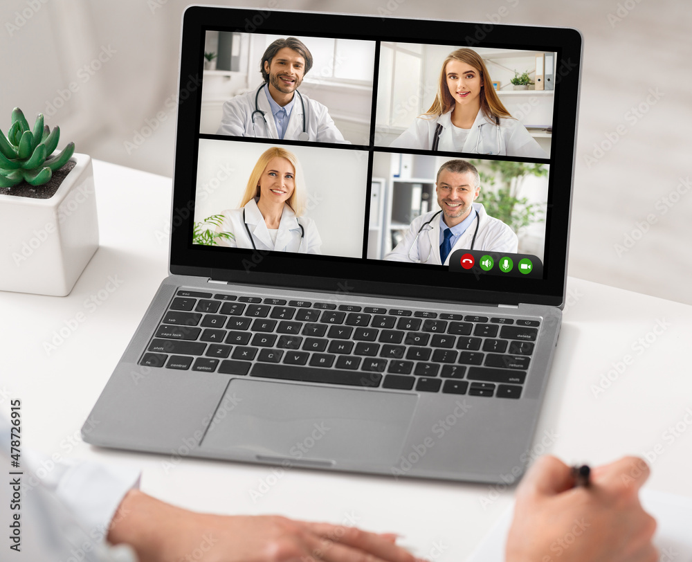 Professional Doctors Having Meeting Via Video Call On Laptop Indoor Professional Doctors Having Meeting Via Video Call On Laptop Indoor