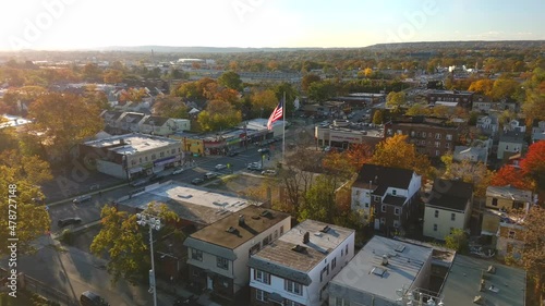 12,933 - Aerial Dolly Close Up Shot of a Large American Flag Waving photo