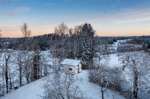 Germany, Bavaria, Bad Heilbrunn, Drone view ofKapelle Sankt Antonius von Padua in winter photo