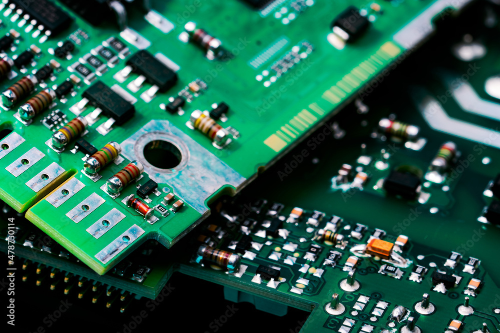 Electronic circuit board. Semiconductor motherboard circuit board technology. Mainboard of computer. Integrated semiconductor microchip on green circuit board. Hi-tech industry and computer science. Electronic circuit board. Semiconductor motherboard circuit board technology. Mainboard of computer. Integrated semiconductor microchip on green circuit board. Hi-tech industry and computer science.