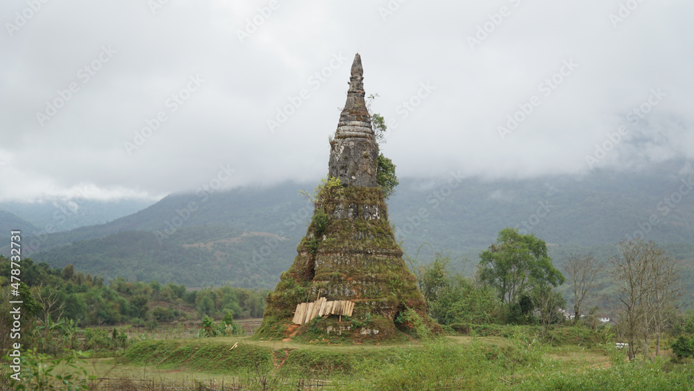 Pagoda on overcast rainy day near the Plain of Jars site in Central Laos.