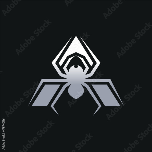 Silver spider logo on black background