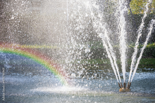 closeup fountain with rainbow