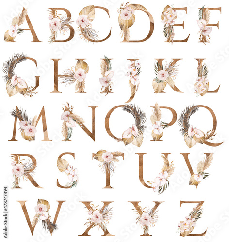 Watercolor letters decorarated with dried leaves and tropical flowers, Bohemian alphabet illustration photo
