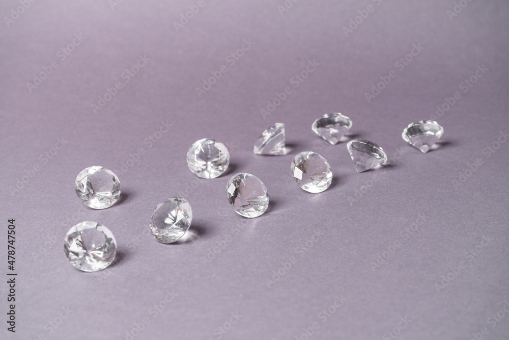 Diamonds out of Glas on a grey Background Diamonds out of Glas on a grey Background