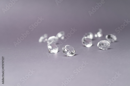 Diamonds out of Glas on a grey Background photo