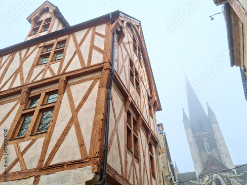 Notre Dame cathedral and half-timbered houses in Dijon, France photo