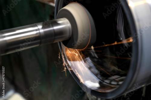Coolant is poured over the entire part on the CNC machine during internal grinding.
