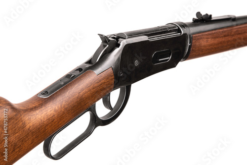 American rifle of the times of the wild west. Vintage weapons. Isolate on a white back