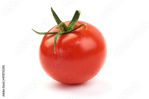 Fresh cherry tomatoes, isolated on white background.