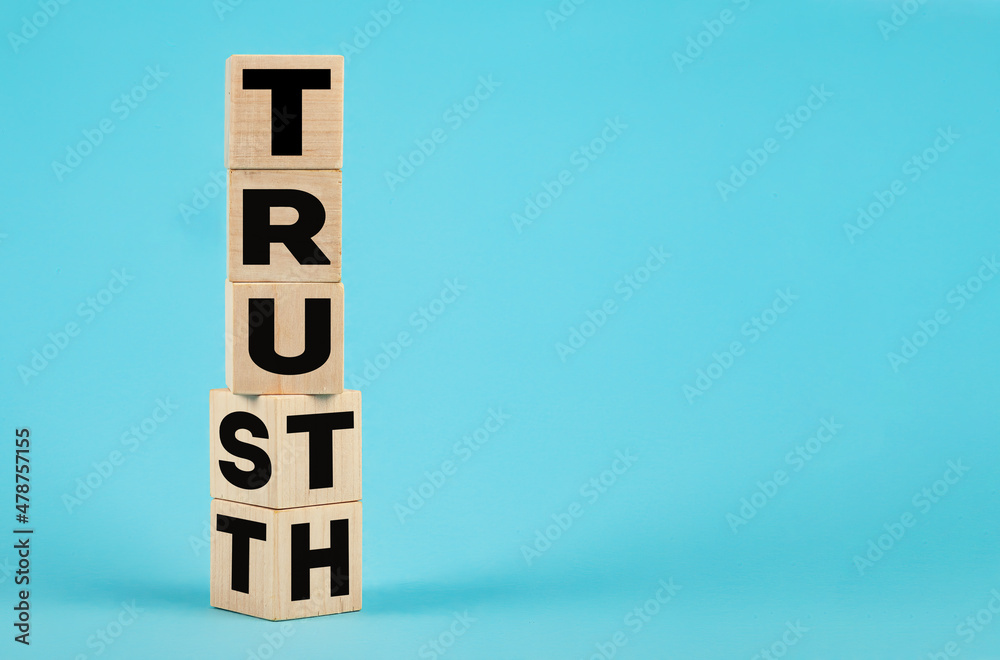 Truth instead of trust. Turns the bones and changes the word Trust to Truth. Business concept Truth instead of trust. Turns the bones and changes the word Trust to Truth. Business concept