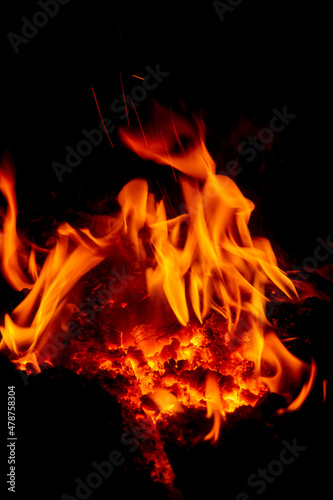 Open fire abstraction on a dark background