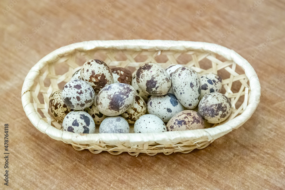 Fresh quail eggs. Dietary natural product in a thin spotted shell Fresh quail eggs. Dietary natural product in a thin spotted shell