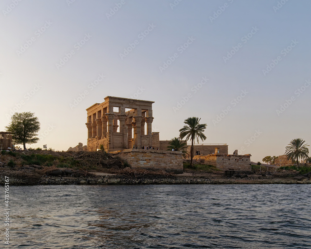 View from the river on the Philae Temple in Aswan on the Nile in Egypt