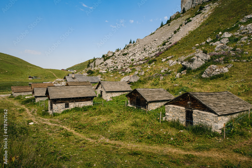 Small stone barns high up in the Vaud Alps above Leysin near the top of Tour d' Ai. Canton Vaud, Switzerland