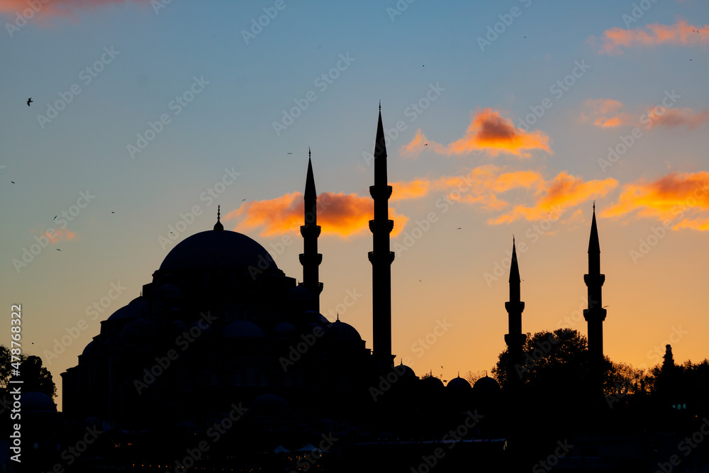 Mosque background photo. Silhouette of Suleymaniye Mosque at sunset