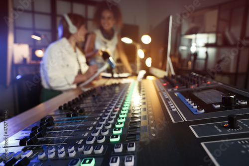 Wallpaper Mural Women working in modern radio studio, focus on professional mixing console Torontodigital.ca