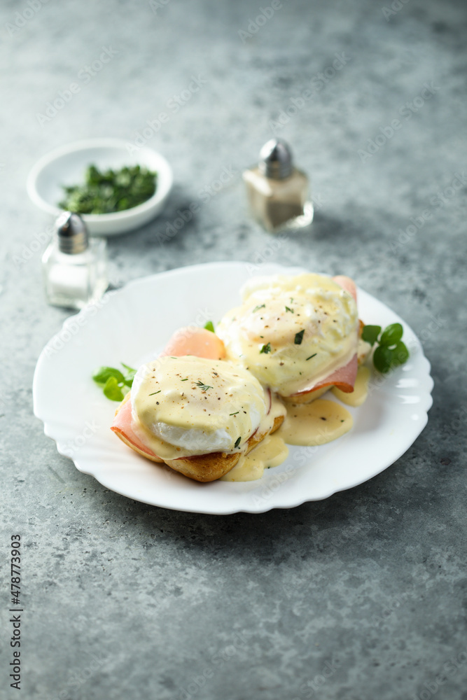 Traditional homemade Benedict eggs with ham