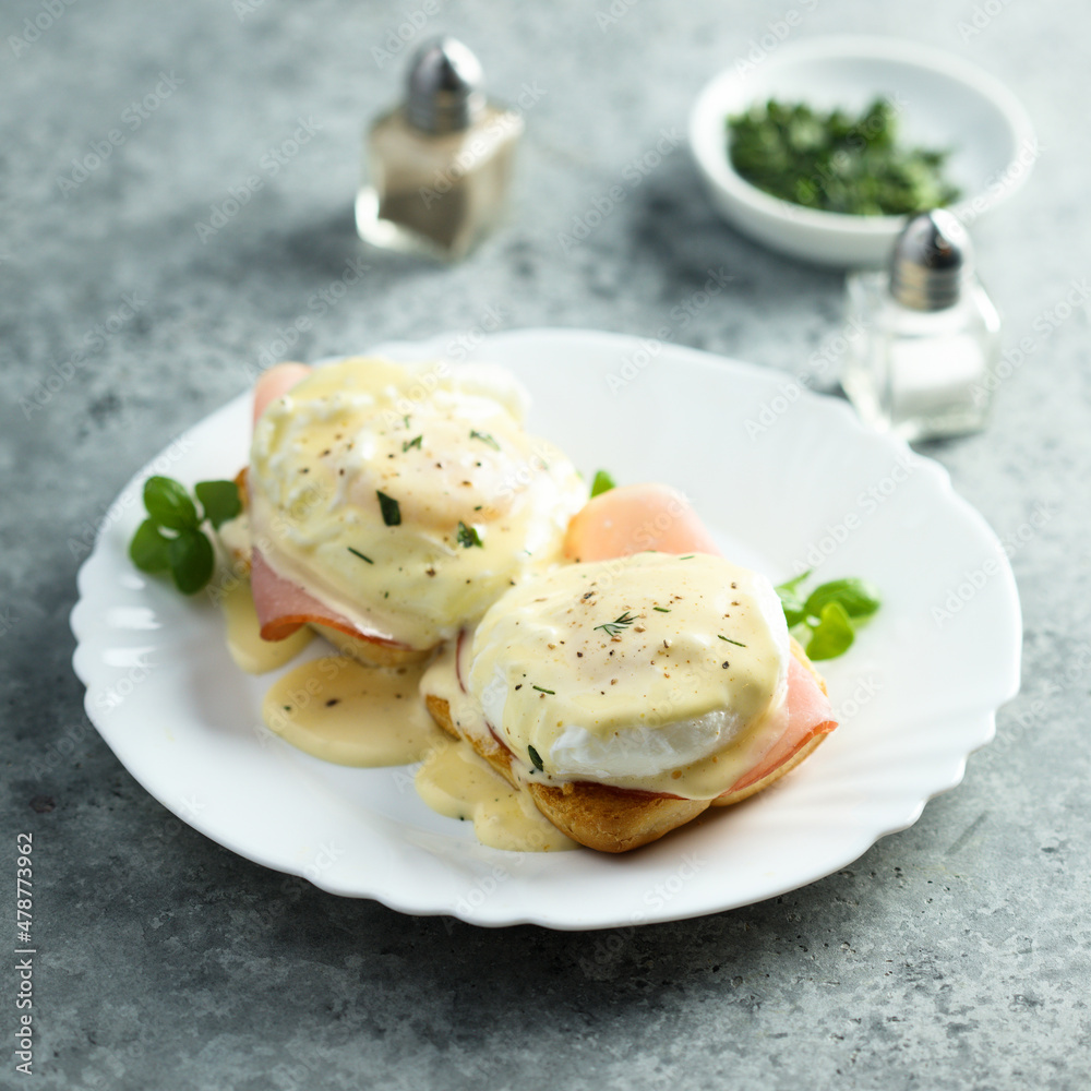 Traditional homemade Benedict eggs with ham Traditional homemade Benedict eggs with ham