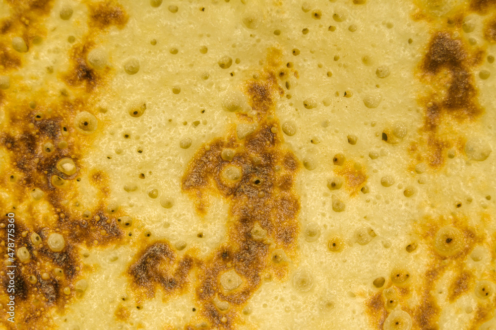 Fresh homemade pancakes on a plate close-up. Shrovetide. Pancake day. Maslenitsa. Cooked food for the holiday. Soft focus Fresh homemade pancakes on a plate close-up. Shrovetide. Pancake day. Maslenitsa. Cooked food for the holiday. Soft focus