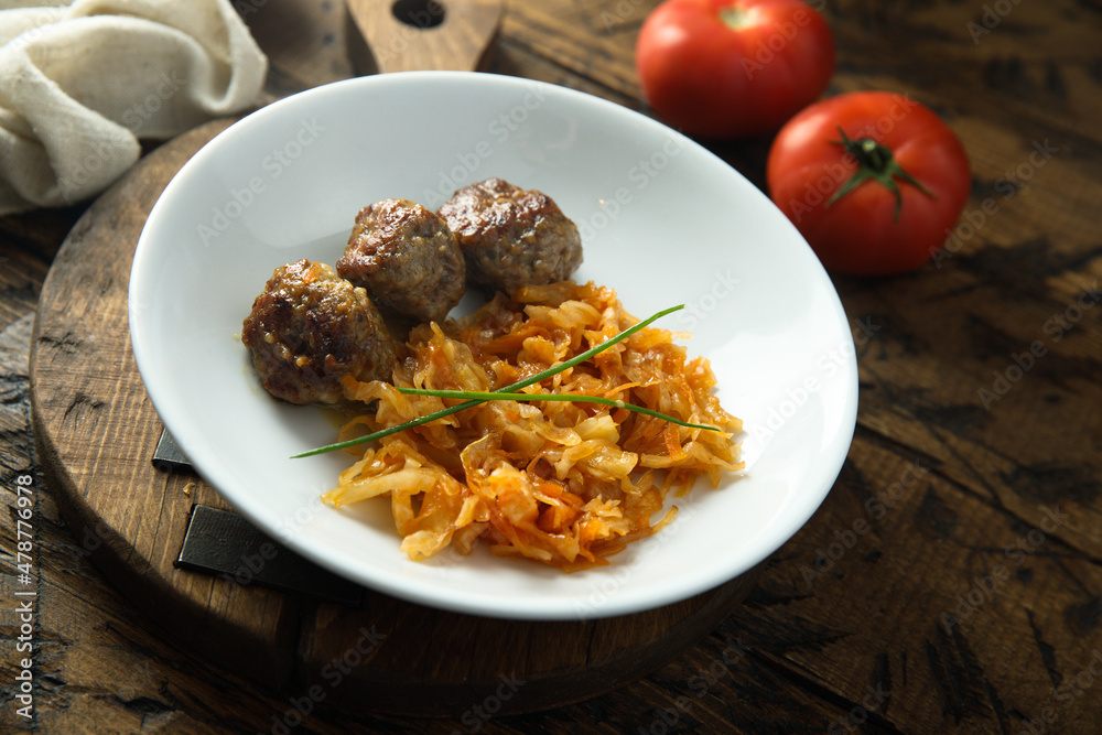 Homemade meatballs with cabbage and tomato Homemade meatballs with cabbage and tomato