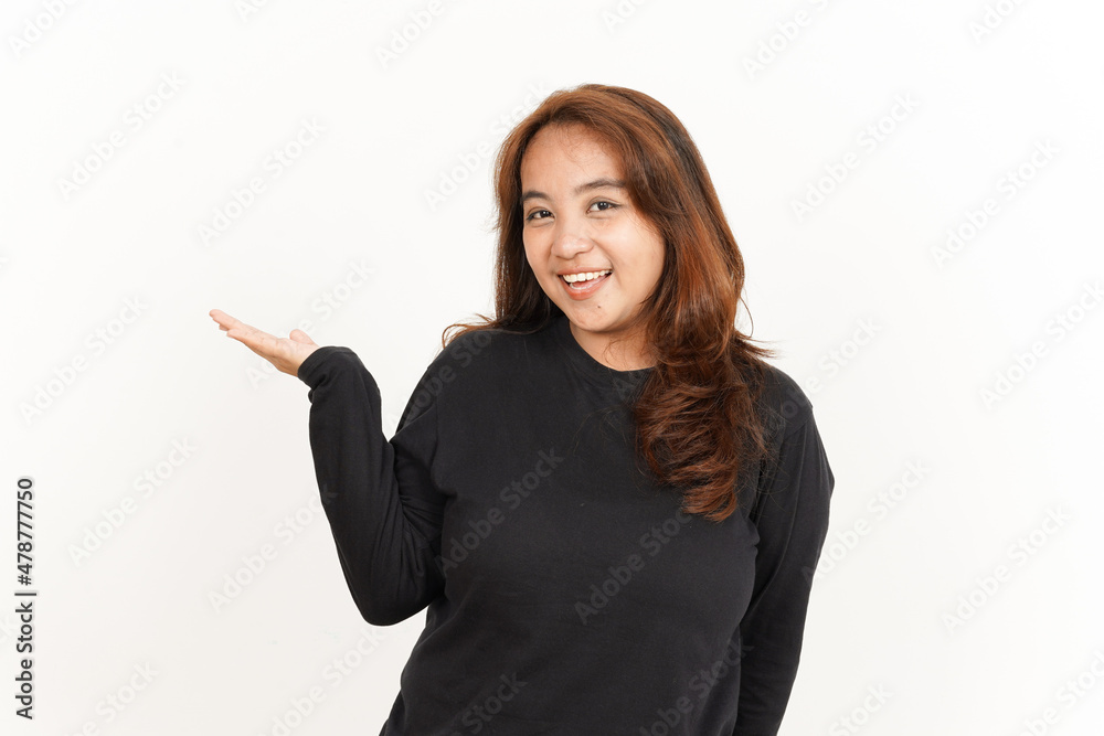 Showing recommended product on open palm Of Beautiful Asian Woman Wearing Black Shirt Showing recommended product on open palm Of Beautiful Asian Woman Wearing Black Shirt