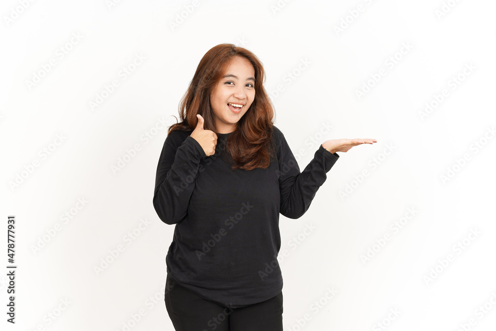 Showing recommended product on open palm Of Beautiful Asian Woman Wearing Black Shirt Showing recommended product on open palm Of Beautiful Asian Woman Wearing Black Shirt