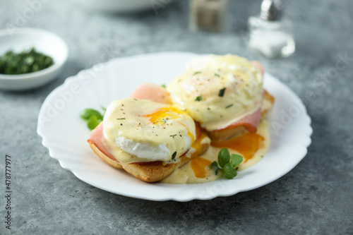 Traditional homemade Benedict eggs with ham