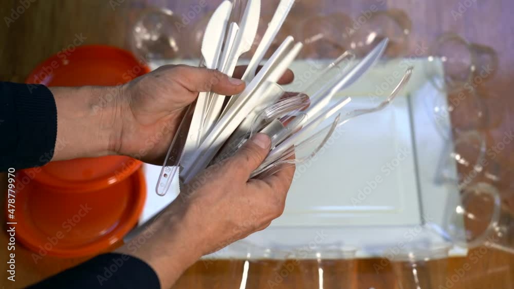 various disposable plastic objects disposable plastic plates, forks