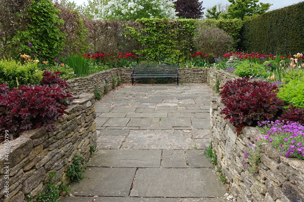 Scenic view of a stone path in a beautiful garden