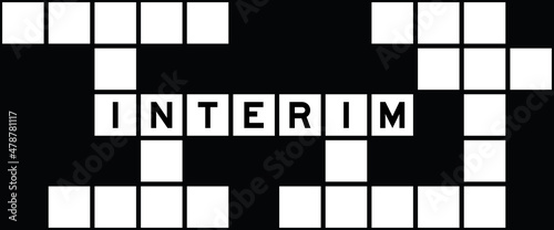 Alphabet letter in word interim on crossword puzzle background
