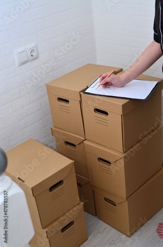 Empty cardboard boxes are on the floor.