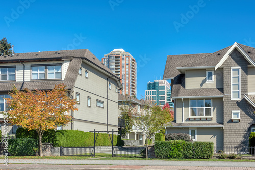 Residential apartment buildings on blue sky background