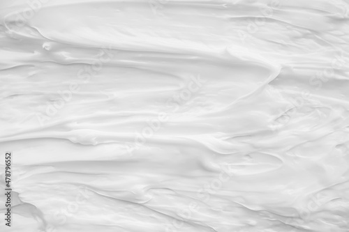 White surface of the cream lotion softens the background.