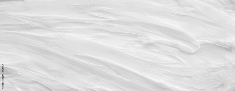 White surface of the cream lotion softens the background. White surface of the cream lotion softens the background.