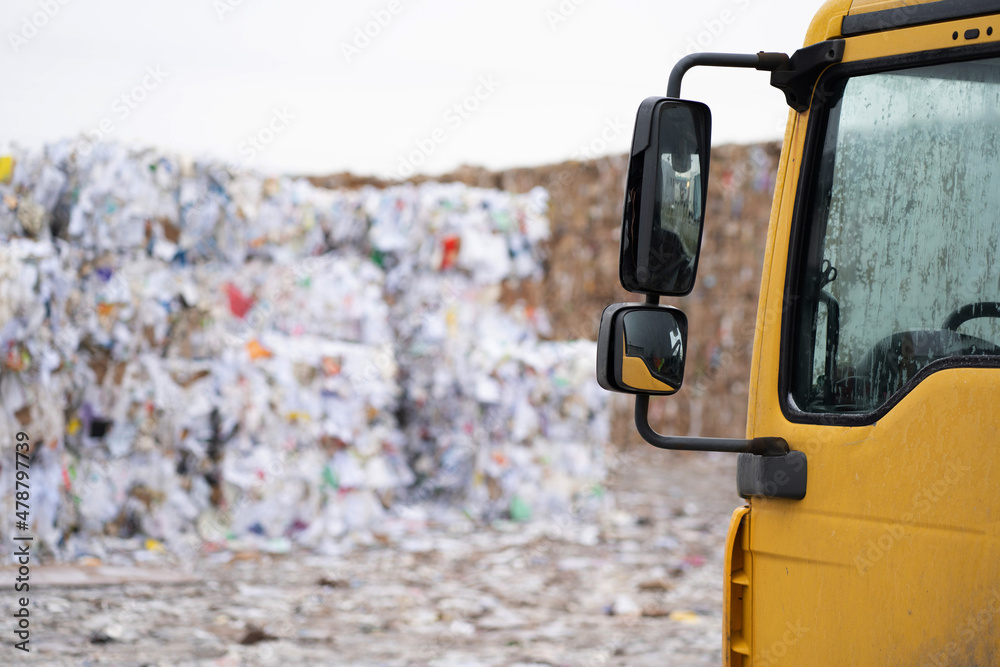 Photo of a car for the delivery of garbage and cardboard for recycling. Photo of a car for the delivery of garbage and cardboard for recycling.
