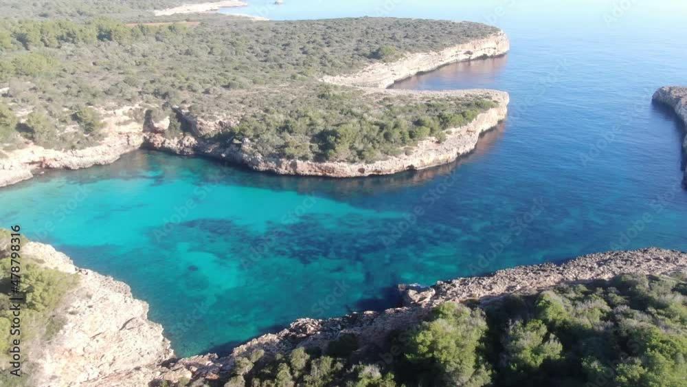 Cala Sa Nau Mallorca beach. Beautiful view of the seacoast of mallorca with an amazing turquoise sea, in the middle of the nature. Concept of summer, travel, relax and enjoy Cala Sa Nau Mallorca beach. Beautiful view of the seacoast of mallorca with an amazing turquoise sea, in the middle of the nature. Concept of summer, travel, relax and enjoy