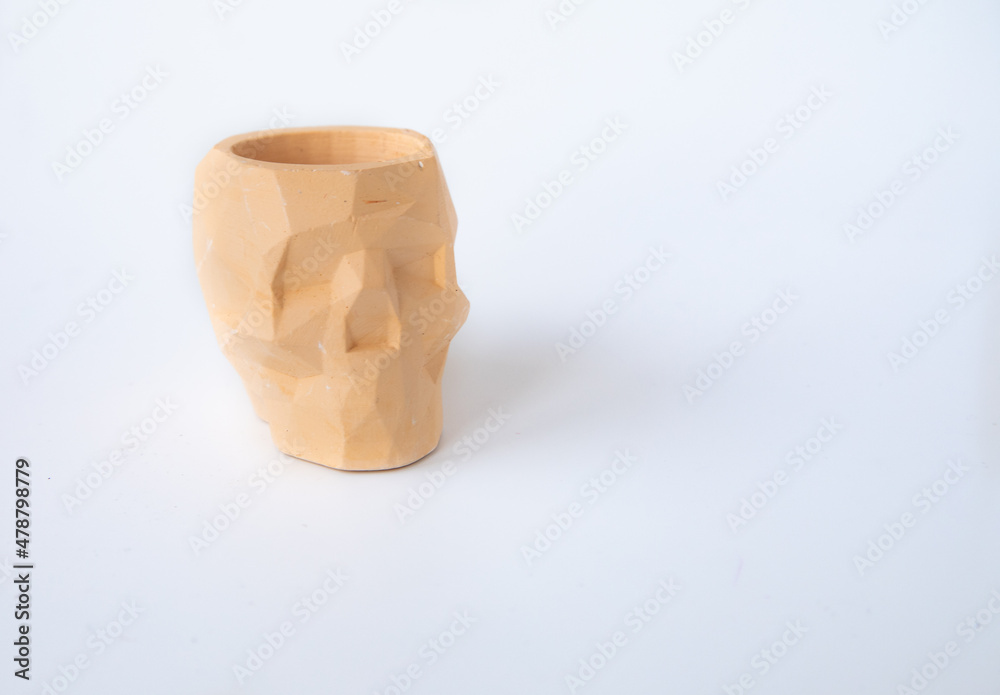 Empty Skull Shape Concrete Plant Pot on white background. Small Modern DIY Cement Planter Trendy Decoration Concrete Organizer in Office Holder for writing Instruments Home decor Loft style Copy space Empty Skull Shape Concrete Plant Pot on white background. Small Modern DIY Cement Planter Trendy Decoration Concrete Organizer in Office Holder for writing Instruments Home decor Loft style Copy space