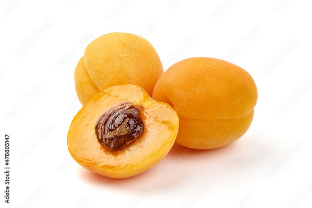Sweet juicy yellow apricots, isolated on white background.