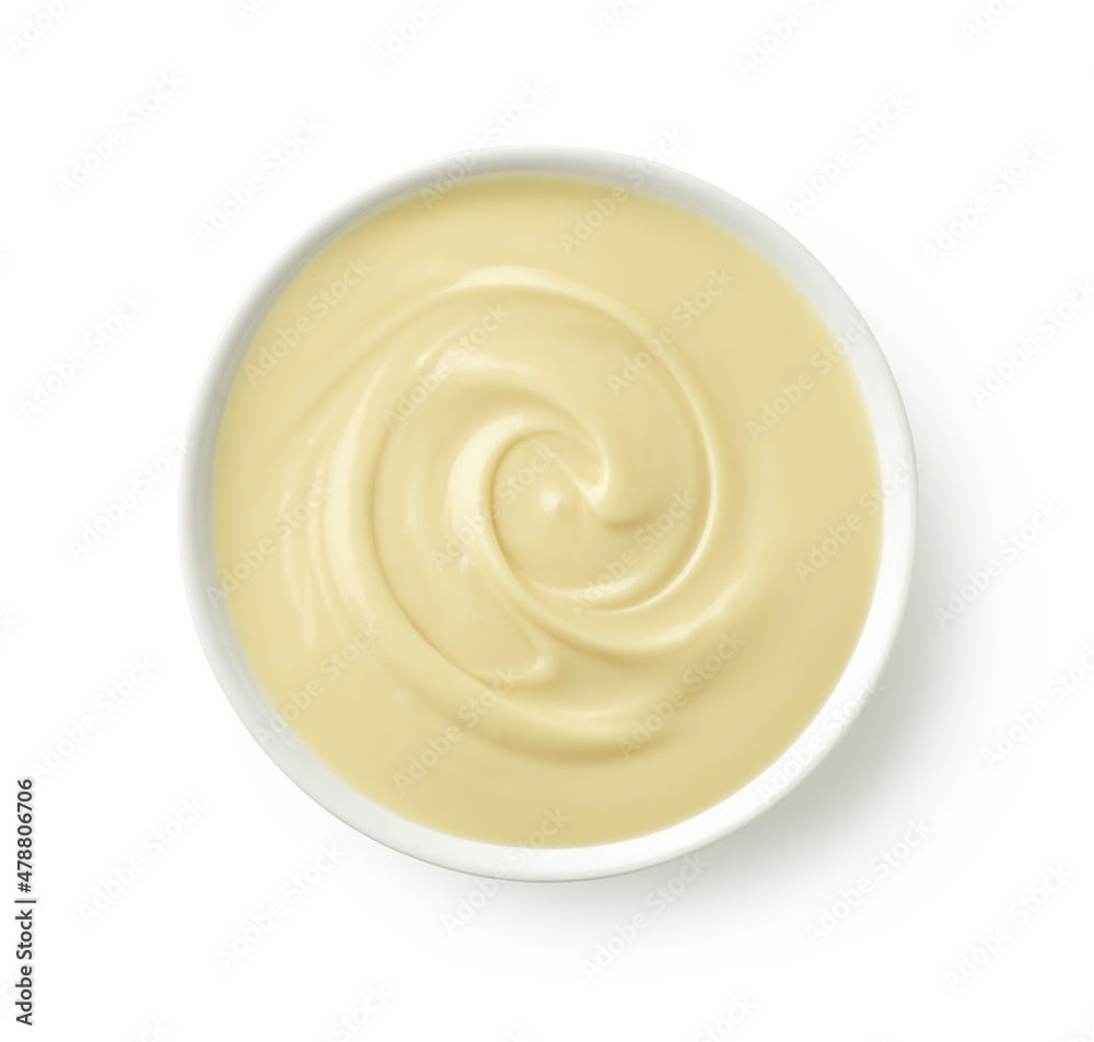 Obraz na płótnie Bowl of melted white chocolate isolated on white background w salonie